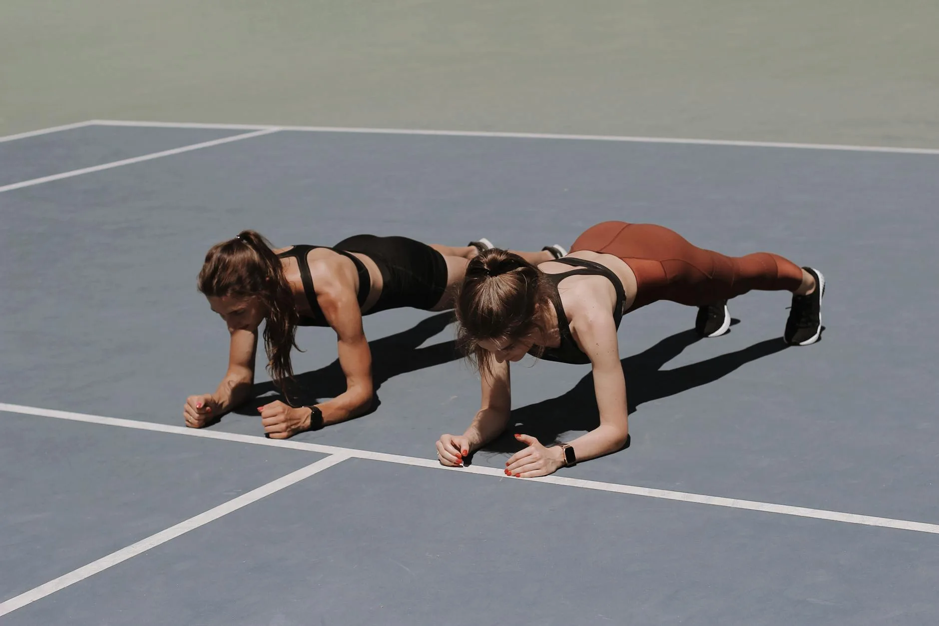 two women doing workout together